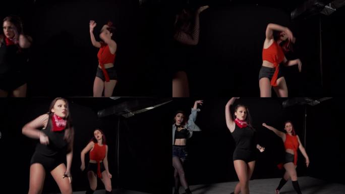 现代年轻女性录制舞蹈视频，以便家庭隔离中的人们可以自娱自乐