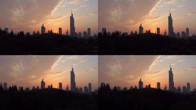 日落时间飞行在南京市中心城市景观湖滨湾空中全景4k中国