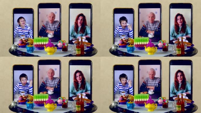 家人使用视频连接在娃娃桌上交流和喝茶