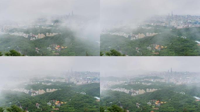 时间流逝: 从台湾台北碧山寺的角度看，下雨后烟雾弥漫的台北城市景观的空中全景。