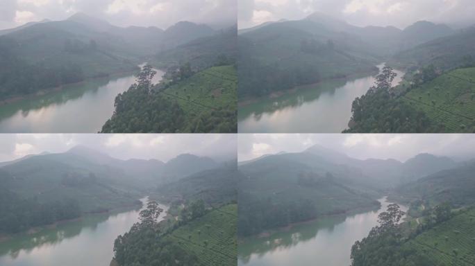 印度蒙纳尔薄雾笼罩的西高止山脉湖泊的空中无人机视图
