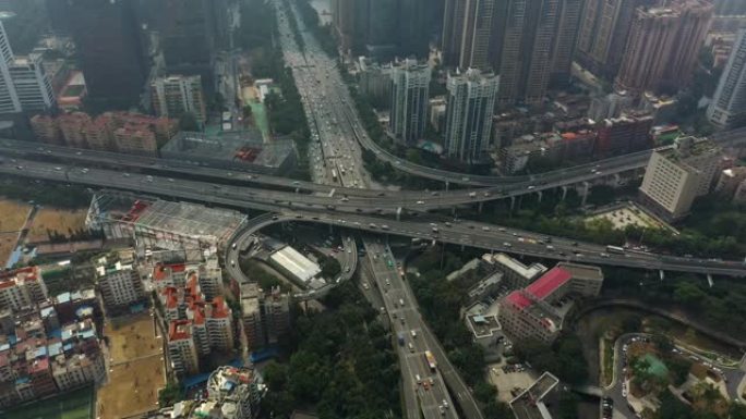 阳光灿烂的一天广州市中心著名的交通街路口空中全景4k中国