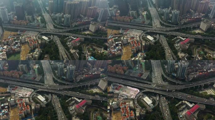 阳光灿烂的一天广州市中心著名的交通街路口空中全景4k中国
