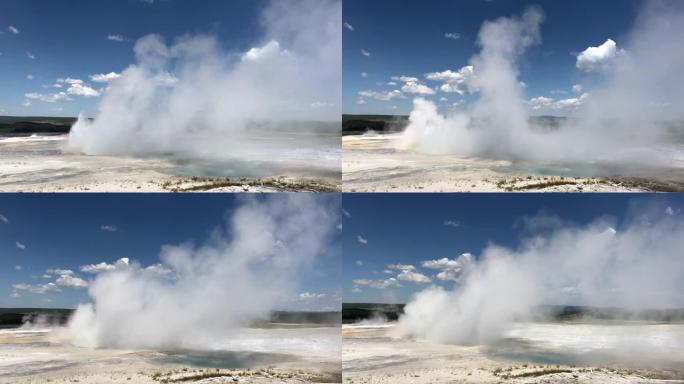 黄石国家公园下盆地间歇泉Clepsydra间歇泉喷出的蒸汽和滚烫水令人惊叹。