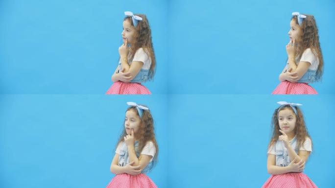 在4k视频中，小女孩在蓝色背景上做出决定。