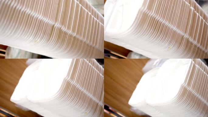 许多送货白色泡沫午餐盒、聚苯乙烯泡沫塑料盒的特写