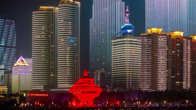 青岛市著名夜间照明市中心海湾纪念碑延时全景4k中国