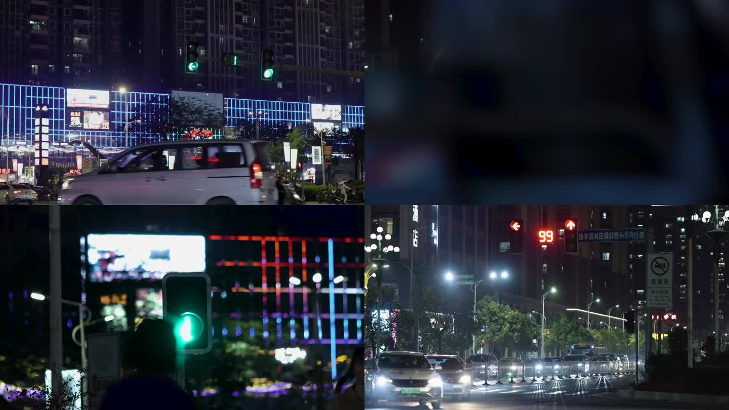 夜晚红绿灯倒数车流人行道