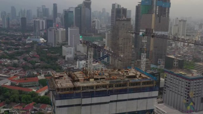 阴天雅加达市市中心屋顶建设航空全景4k印度尼西亚