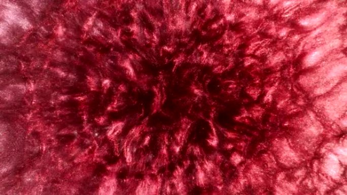红色抽象迷幻变形流动漩涡沸腾宇宙有机图案背景。