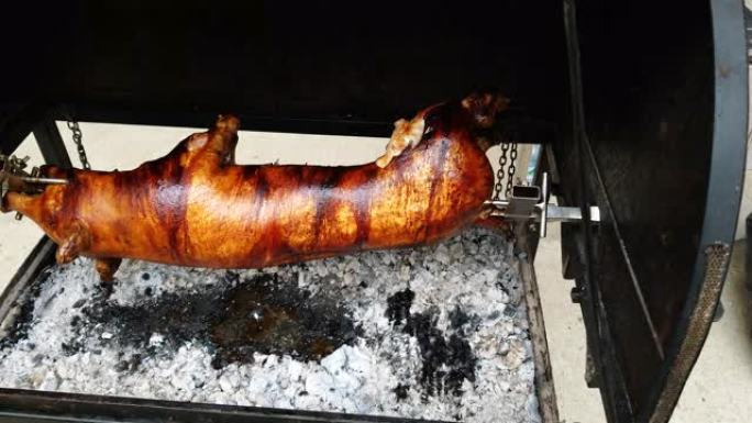 在烤架上烹饪小猪的传统方法
