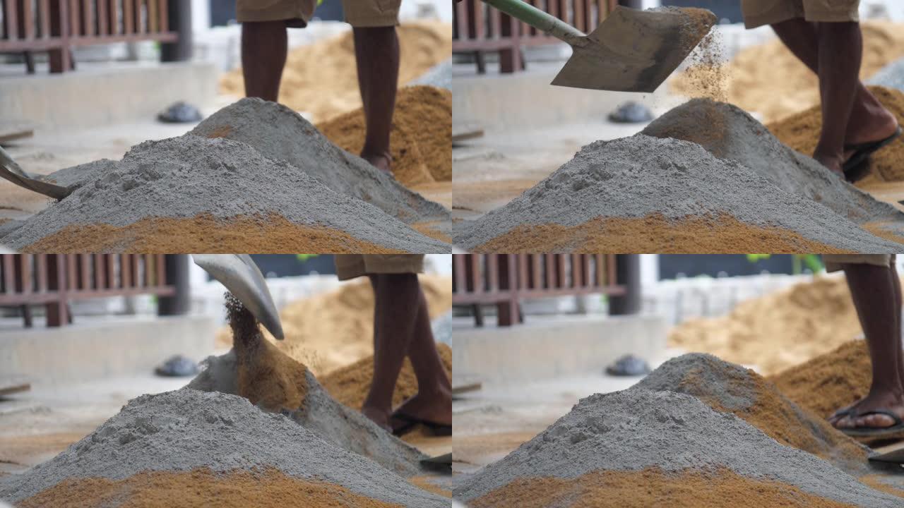当地人用水泥盖住黄沙堆