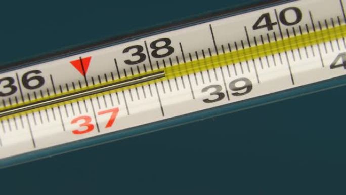 特写温度计，水银，显示温度为38度。表示发热和高发热。