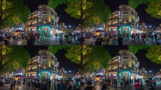 杭州市夜间照明著名步行街十字路口全景延时4k中国