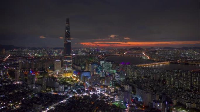 日落之夜照亮首尔城市著名塔空中全景4k延时韩国