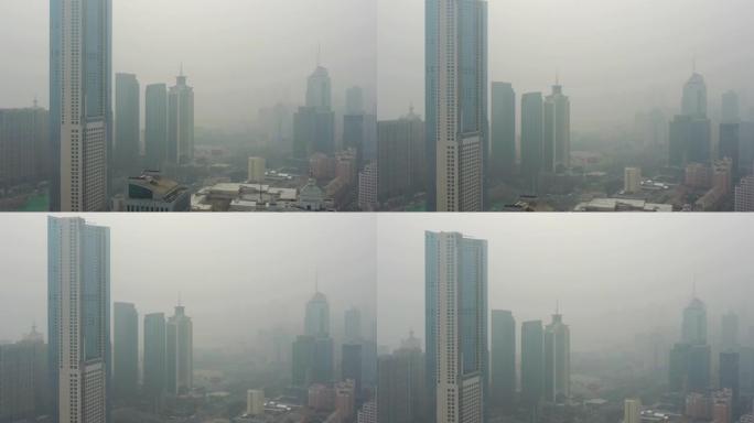 白天烟雾青岛市公寓住宅市中心区域空中全景4k中国