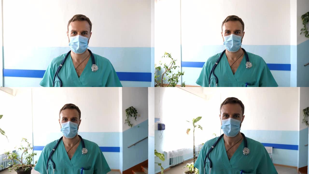 戴着医用口罩的年轻男医生的肖像走进医院。病毒上班时戴着防护口罩的医务人员。冠状病毒大流行带来的健康和