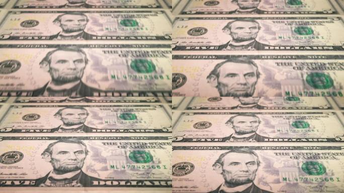 印刷5美元钞票的可循环特写，雕刻和印刷局