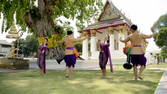 Yonung亚洲泰国传统木鼓舞表演。4k慢动作。