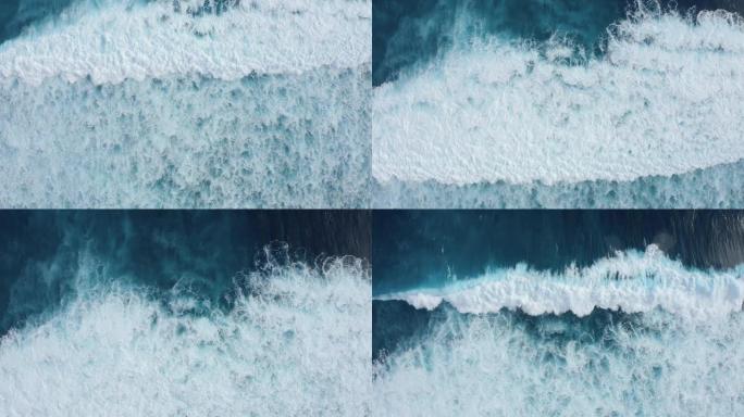 慢动作自上而下鸟瞰图的海洋巨浪，起泡和飞溅