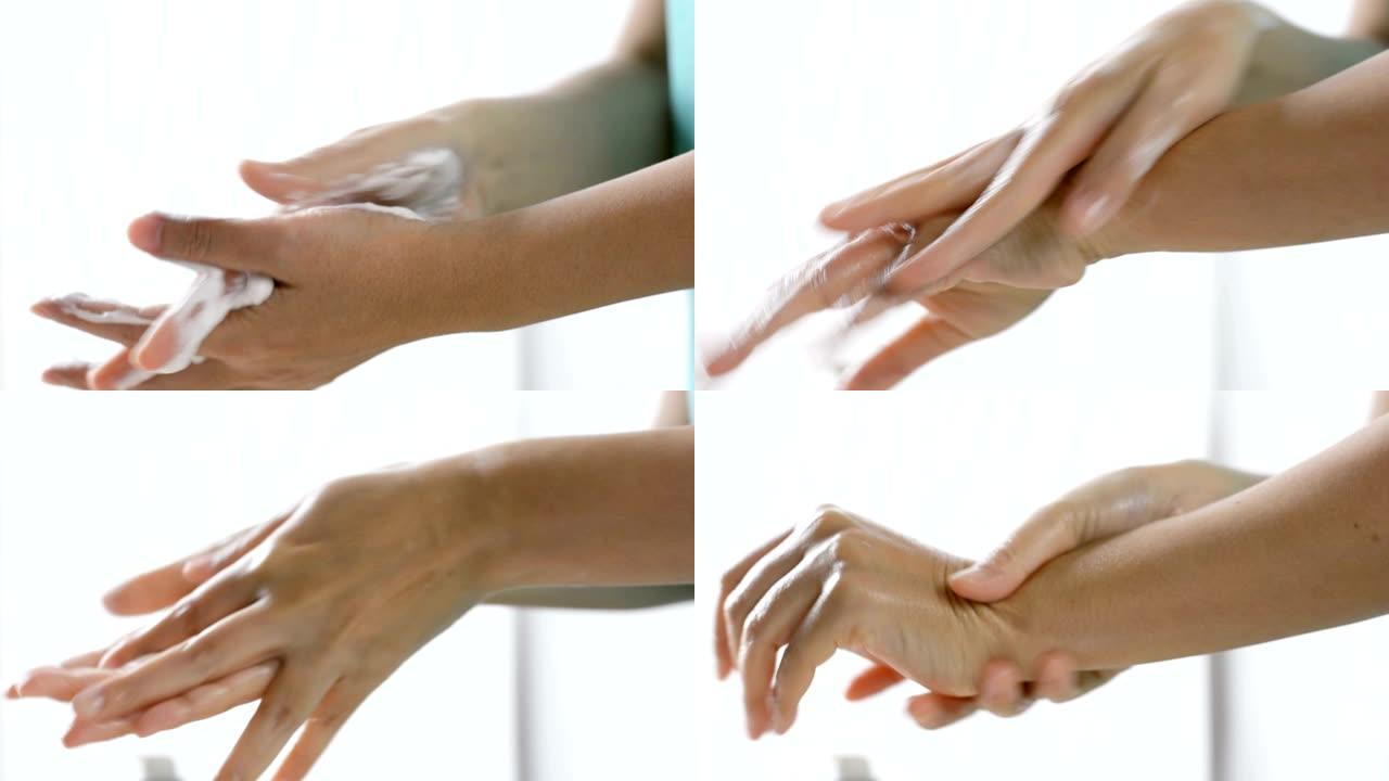 特写女性手部使用护手霜泡沫护理在她的手上，女性皮肤护理。