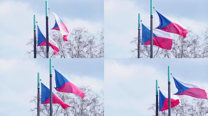 捷克国旗在阳光明媚的天气中随风飘扬。