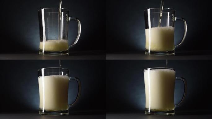 将新鲜啤酒倒入啤酒杯中。慢动作和黑暗风格