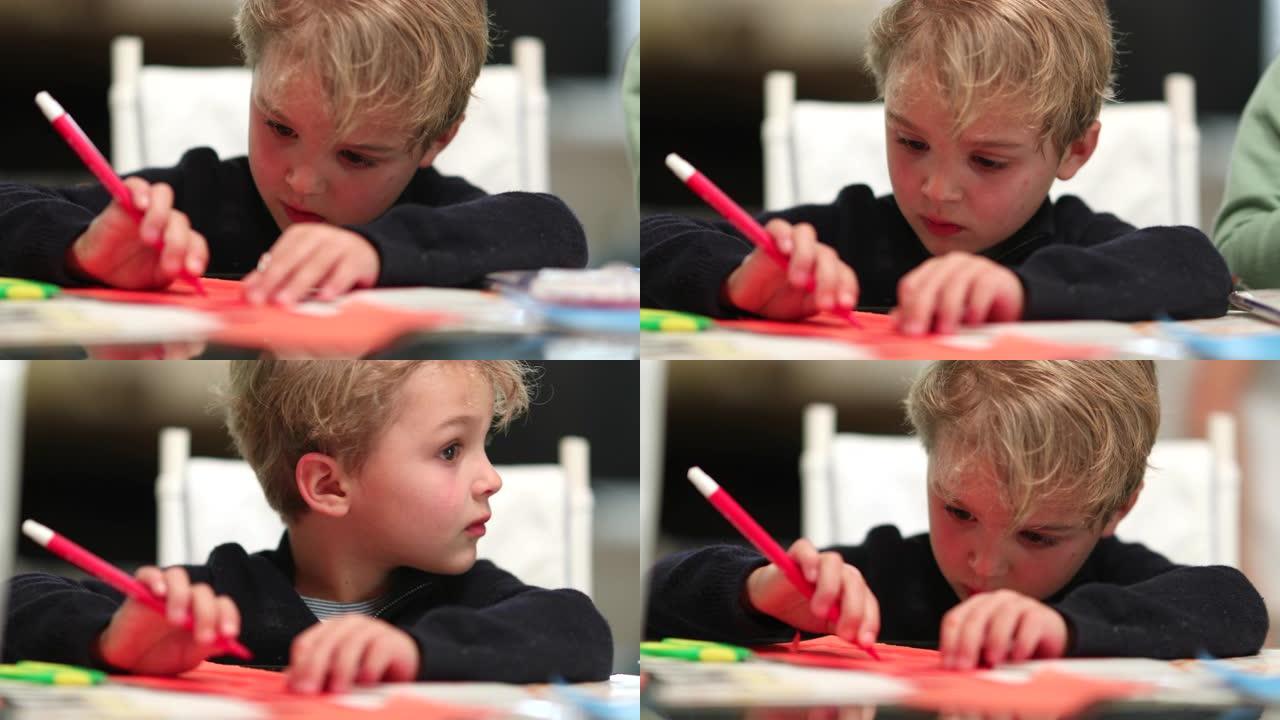 婴儿幼儿用红笔在纸上绘画，创意儿童着色工艺