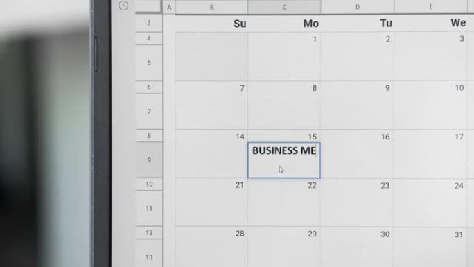 在日历上的15日写商务会议以记住这个日期。