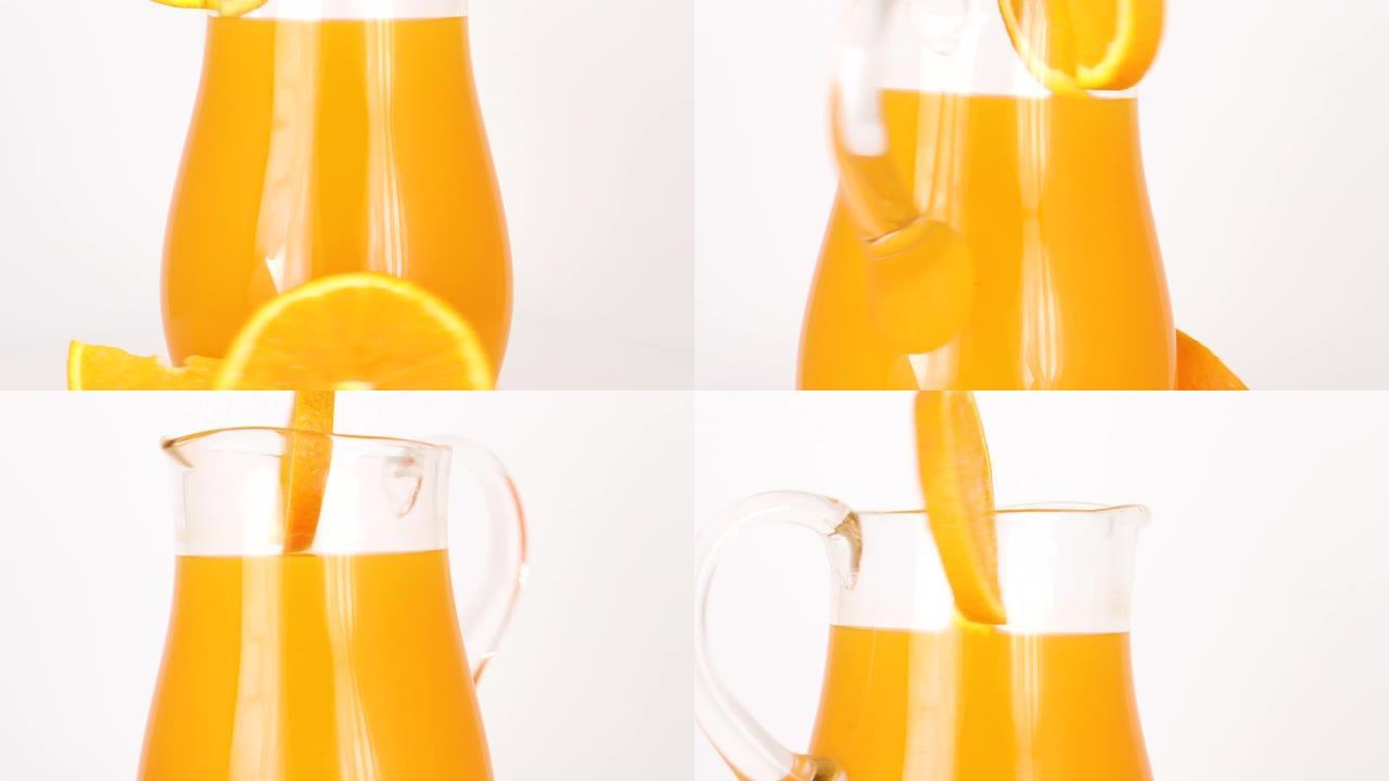 用橙汁和新鲜橙片在圆罐中旋转