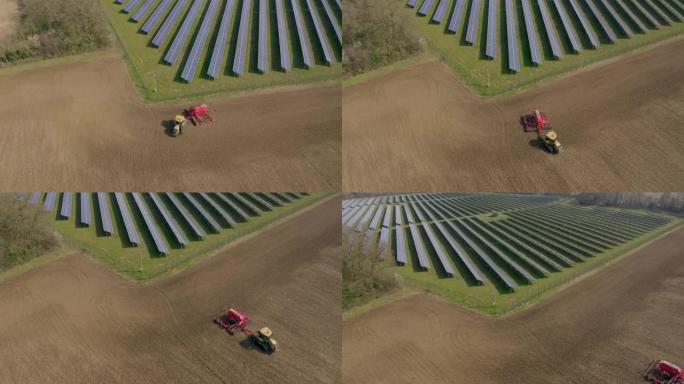 与传统耕地相邻的新时代太阳能农场