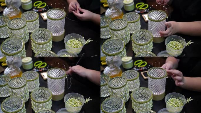 一位亚洲泰国妇女的手工照片在玻璃上装饰茉莉花工艺泰国文化手工艺术