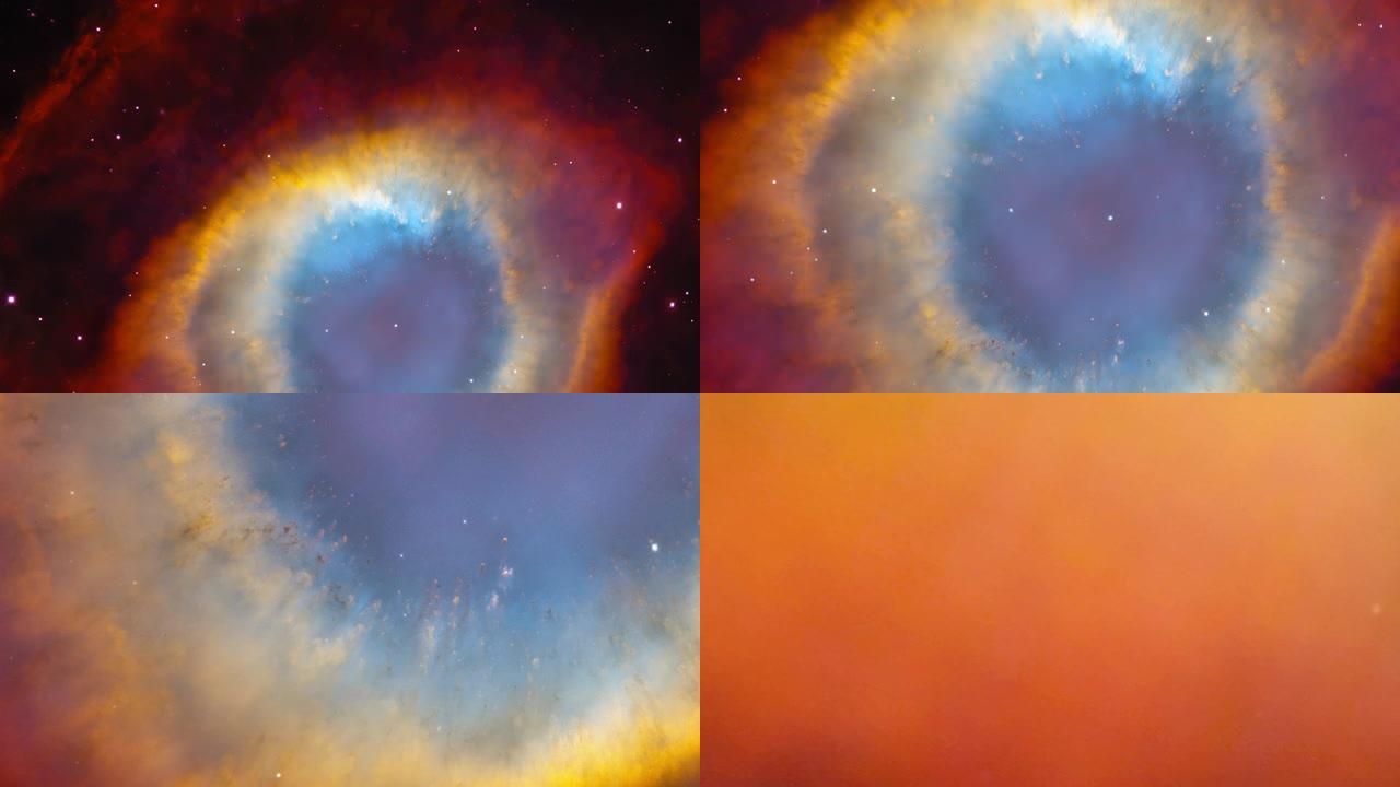 飞入螺旋星云的橙色和红色气体，也称为NGC 7293。