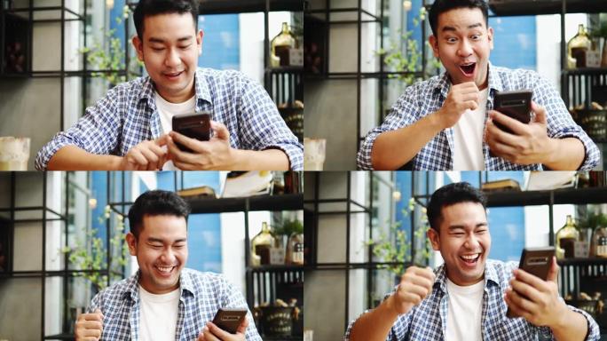 聪明的亚洲男人在咖啡馆使用智能手机，喝咖啡，生活方式理念。