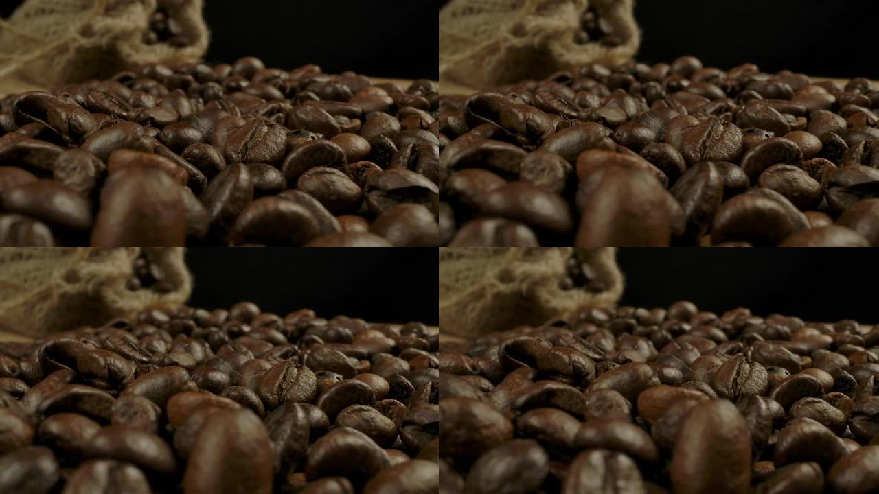 烤咖啡豆和黄麻袋的宏观视图