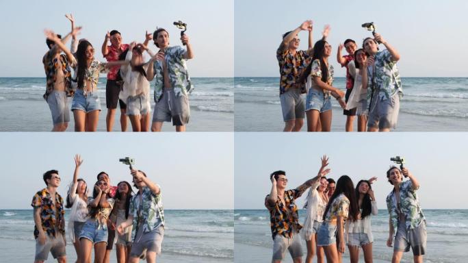 团体青少年亚洲华人旅游海边海滩夏天。旅行者年轻有趣，享受智能手机自拍。群友拍摄视频旅游博主。4K U