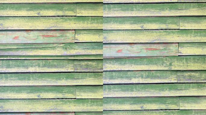 绿色的旧木质纹理，表面剥落复古油漆。