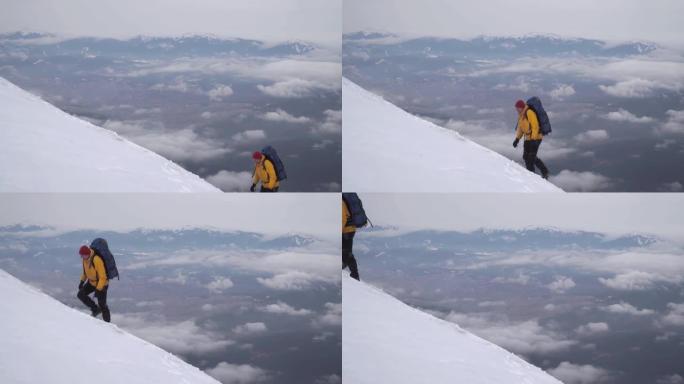 一位旅行者爬山的雪坡