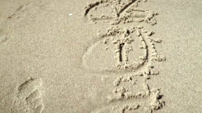 在沙滩上写的shadow传递单词summer