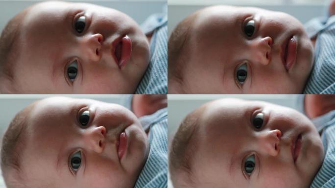 婴儿新生儿特写镜头对着镜头