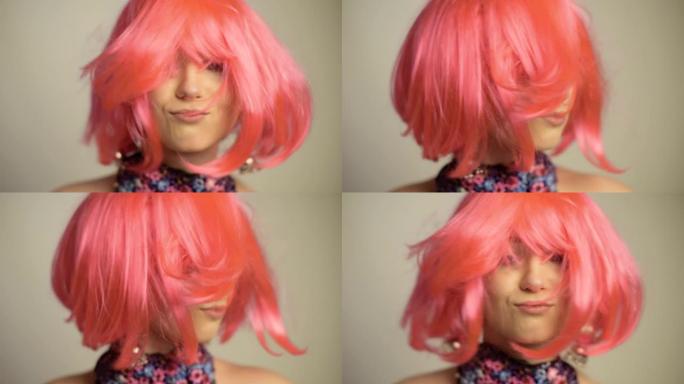 一个女孩，粉红色的头发和广场舞，视频回旋镖，女孩酷音乐，舞蹈。