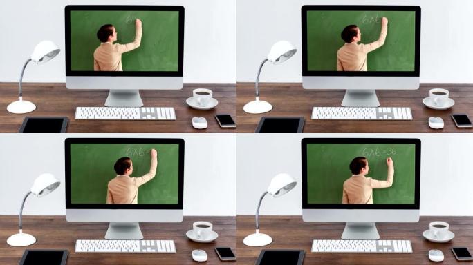 电脑显示器在屏幕上显示高加索女老师的动画