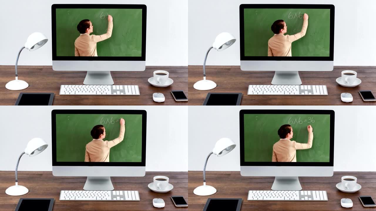 电脑显示器在屏幕上显示高加索女老师的动画