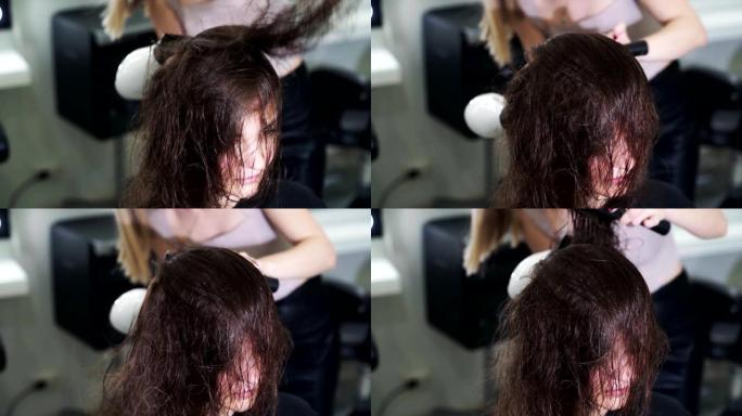 特写，理发师用吹风机干湿头发，慢动作