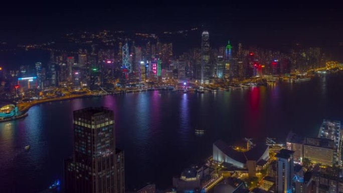 飞越香港维多利亚港市中心夜间照明航空全景4k延时