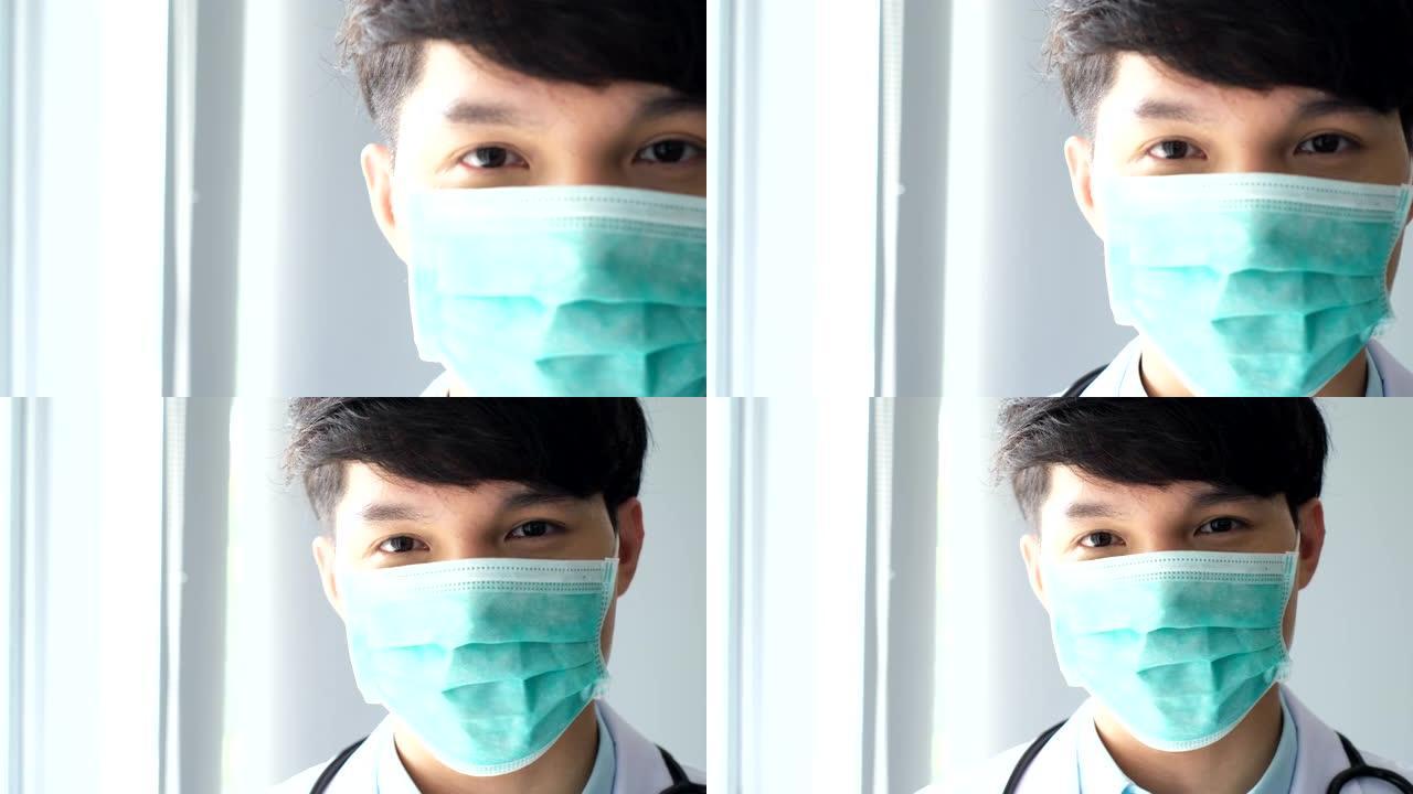 年轻的亚洲医生在诊所戴上防护口罩。概念健康与安全，N1H1冠状病毒检疫，病毒保护 .. 摘下口罩。