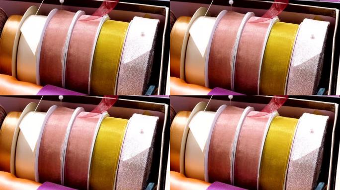 彩色丝带的特写镜头，制作鲜花花束。4K