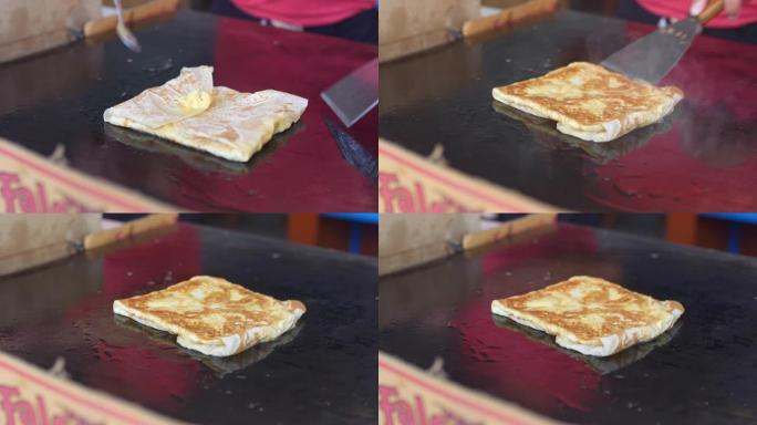 用鸡蛋制作Roti小吃，泰国街头小吃夜市