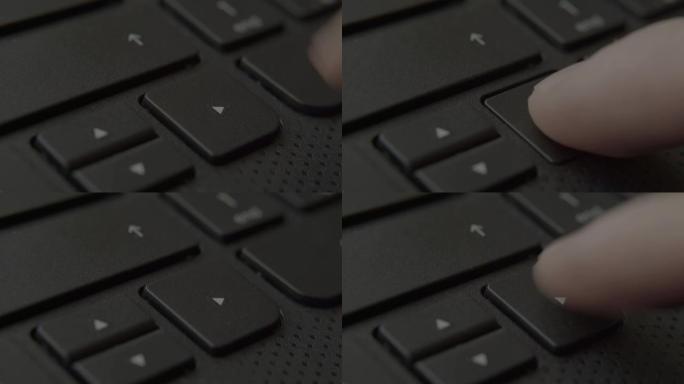 手指按下键盘上的右键