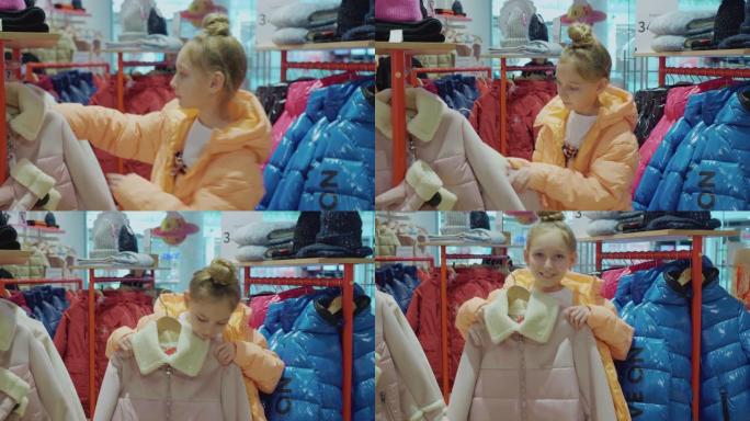 快乐女孩在时尚精品店尝试时尚粉色夹克